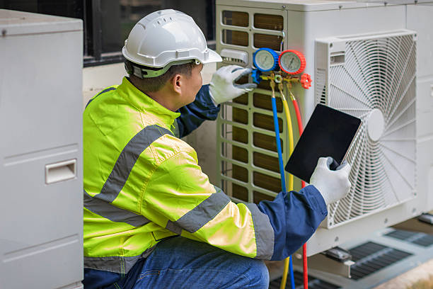 Professional Air Conditioning Repair technician working in Goffstown, NH